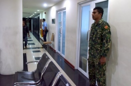 Security forces situated outside the office of Maldives Marketing and Public Relations Corporation following the uncovering of the scandal and the investigation that led afterwards. PHOTO: MIHAARU FILE PHOTOS