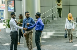 Civil Service workers in from of Velaanage office complex. PHOTO: NISHAN ALI/ MIHAARU