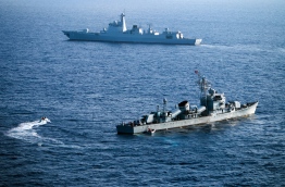 (FILES) This file photo taken on May 5, 2016 shows crew members of China's South Sea Fleet taking part in a drill in the Xisha Islands, or the Paracel Islands in the South China Sea. 
Beijing braced on July 12, 2016 for an international tribunal's ruling on the South China Sea, where it has expansive territorial claims, with all eyes watching for the Asian giant's reaction on the ground or in the water. Beijing claims sovereignty over almost the whole of the South China Sea, on the basis of a segmented line that first appeared on Chinese maps in the 1940s, pitting it against several neighbours. / AFP PHOTO / STR / 