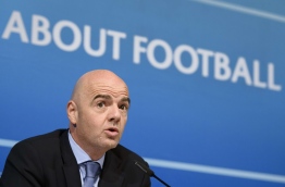 (FILES) - This file picture taken on October 15, 2015 at the European football's governing body headquarters in Nyon shows UEFA General Secretary Gianni Infantino during a press conference following an UEFA Executive meeting. Infantino is to stand for the presidency of FIFA after receiving the backing of the Executive Committee of European football's governing body on OCtober 26, 2015.      AFP PHOTO / FABRICE COFFRINI