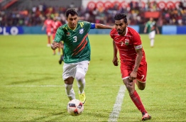 Ali Ashfaq in the national jersey performing during a friendly clash with Bangladesh. -- Photo: Nishan Ali / Mihaaru News