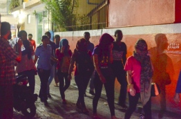 Police arresting individuals involved in sex work from Malé in November 2016 --