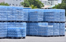 Stacks of bottled water produced in the Maldives. PHOTO: NISHAN ALI / MIHAARU