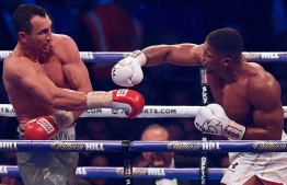 Anthony Joshua vs. Wladimir Klitschko was a professional boxing match contested between Anthony Joshua and Wladimir Klitschko. The event took place on 29 April 2017 at Wembley Stadium in London, England, with Joshua's IBF and the vacant WBA and IBO heavyweight titles on the line. PHOTO: AFP
