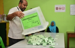 Vote counting from a ballot box for the Local Council Elections in 2017. Government allocates minimum quota of voters registered at a foreign country must be 150 for ballot boxes to be kept there. PHOTO: MIHAARU