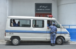 Members of the Maldives Police Service operating in front of the Criminal Court. PHOTO: HUSSAIN WAHEED/ MIHAARU