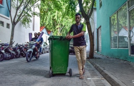 [File] WAMCO employees collect waste from households in Male': Company seeks parties to develop business plan for next five years 