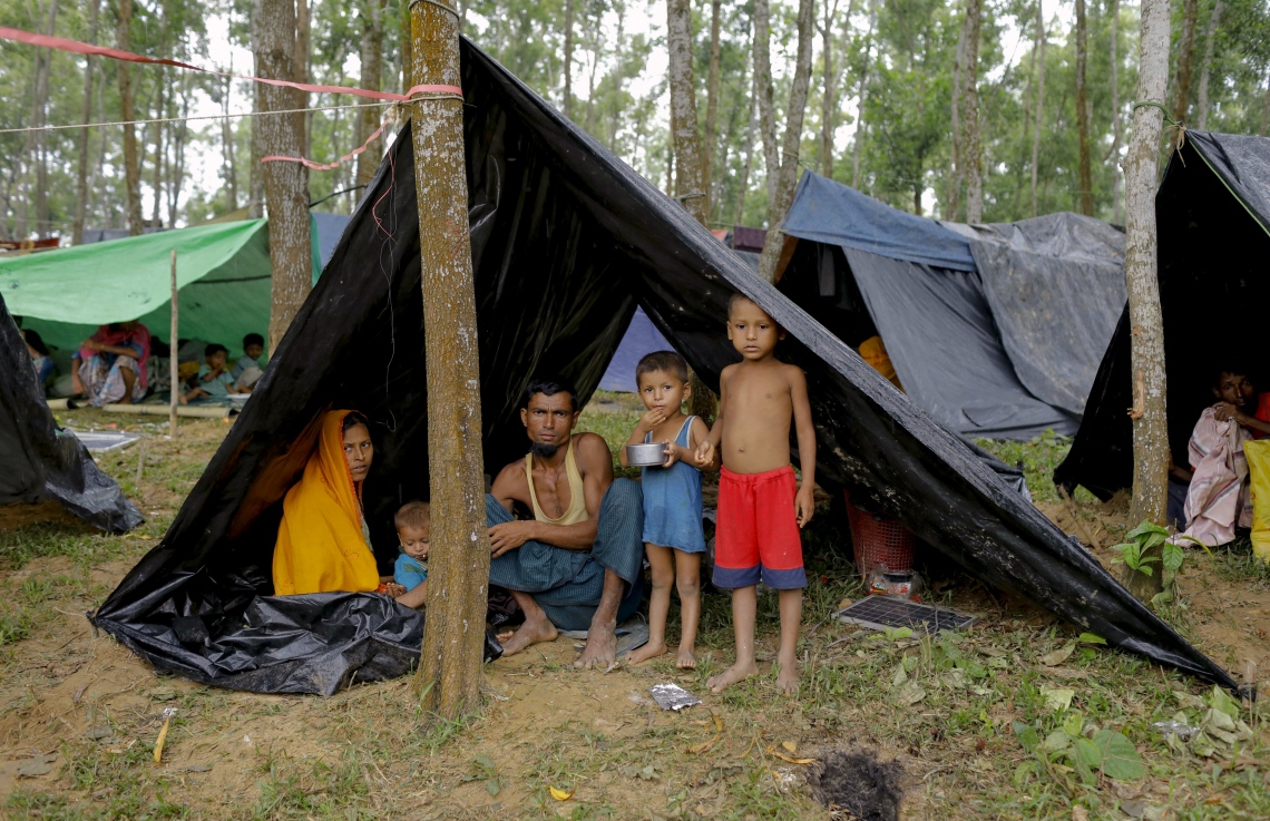 މިއަންމާގެ ރެފިއުޖީންގެ ބަޔަކު ބަންގްލަދޭޝްގެ ފޭލިގެއެއްގައި. --ފޮޓޯ:އޭއެފްޕީ