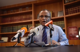 Lawyer Husnu Al Suood speaks at a press conference. PHOTO/MIHAARU