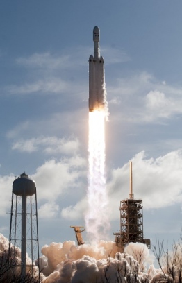 The SpaceX Falcon Heavy launches from Pad 39A at the Kennedy Space Center in Florida, on February 6, 2018, on its demonstration mission.
The world's most powerful rocket, SpaceX's Falcon Heavy, blasted off Tuesday on its highly anticipated maiden test flight, carrying CEO Elon Musk's cherry red Tesla roadster to an orbit near Mars. Screams and cheers erupted at Cape Canaveral, Florida as the massive rocket fired its 27 engines and rumbled into the blue sky over the same NASA launchpad that served as a base for the US missions to Moon four decades ago.
 / AFP PHOTO / JIM WATSON