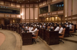 Lawmakers pictured at a parliament sitting. PHOTO/MAJILIS