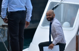 Dhiggaru MP Faris Maumoon arrives for a hearing at the Criminal Court. FILE PHOTO/MIHAARU