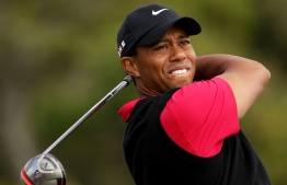 PEBBLE BEACH, CA - JUNE 20:  Tiger Woods watches a tee shot during the final round of the 110th U.S. Open at Pebble Beach Golf Links on June 20, 2010 in Pebble Beach, California.  (Photo by Andrew Redington/Getty Images)