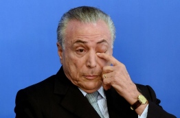 With Dilma Rousseff accusing him of having engineered a coup, Brazil's acting president Michel Temer faces bitter opponents on the left. In the latest incident, riot police were sent to clear out protesters near his home in Sao Paulo and also at a presidential office in the city.