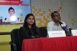 Ooredoo Maldives assistant manager Noora Ibrahim Zahir (L) speaking during a press conference. PHOTO/MIHAARU