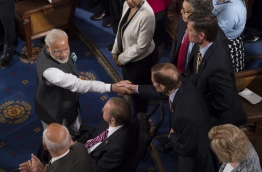 Indian Prime Minister Narendra Modi greets members of Congress prior to addressing a joint session of Congress on Capitol Hill on June 8, 2016, in Washington, DC. / AFP PHOTO