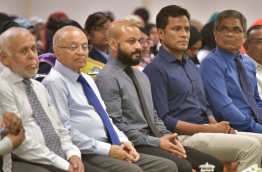 Faaris Maumoon (3rd L) pictured with his father Gayoom (2nd L) and the then home minister Umar Naseer (4th L) during a ceremony. MIHAARU FILE PHOTO/MOHAMED SHARUHAAN