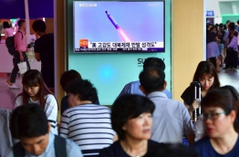 North Korea on July 9 test-fired what appeared to be a submarine-launched ballistic missile (SLBM), Seoul's defence ministry said, a day after the US and South Korea decided to deploy an advanced missile defence system in the South. / AFP PHOTO / JUNG YEON-JE