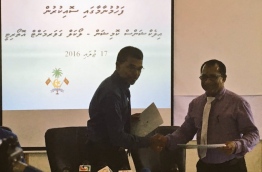 The signing of the agreement between LGA and the elections commission on Sunday. PHOTO/ELECTIONS COMMISSION