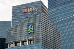 Singapore revealed on July 21 it had seized nearly 180 million USD in assets through its investigations into suspected fraud and money-laundering related to scandal-tainted Malaysian state fund 1MDB. The Singapore authorities also said investigations found Singapore-based DBS Bank, Standard Chartered Bank's Singapore Branch and Swiss-based UBS had exhibited "undue delay in detecting and reporting suspicious transactions." / AFP PHOTO / ROSLAN RAHMAN