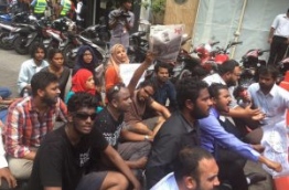 Some local journalists pictured during a sit-down protest in capital male calling on the government to ensure media freedom in the Maldives. FILE PHOTO