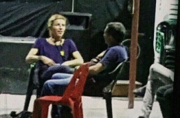 One of the two foreign journalists pictured inside the MDP camp, moments before her arrest on Tuesday.