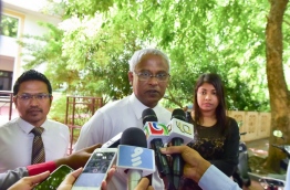 MDP PG group leader Ibrahim Mohamed Solih (C) speaking to reporters outside the parliament building on Wednesday. MIHAARU PHOTO/MOHAMED SHARUHAAN