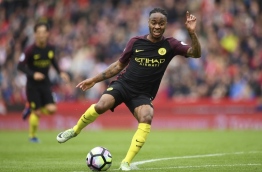 Manchester City's English midfielder Raheem Sterling controls the ball during the English Premier League football match between Stoke City and Manchester City at the Bet365 Stadium in Stoke-on-Trent, central England on August 20, 2016. / AFP PHOTO / Paul ELLIS / RESTRICTED TO EDITORIAL USE. No use with unauthorized audio, video, data, fixture lists, club/league logos or 'live' services. Online in-match use limited to 75 images, no video emulation. No use in betting, games or single club/league/player publications. /