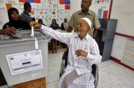 A man casts his ballot during a previous election. AP FILE PHOTO