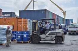 Unloading cargo at the commercial harbour of Maldives Ports Limited. FILE PHOTO: ALI NISHAN/MIHAARU