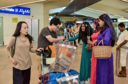 Tourists warmly welcomed with souvenirs on the occasion of World Tourism Day at Ibrahim Nasir International Airport. PHOTO: NISHAN ALI/MIHAARU