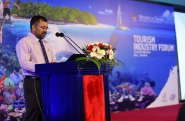 Tourism minister Moosa Zameer speaks at the Tourism Industry Forum. PHOTO: HUSSAIN SHAYAAH/MIHAARU
