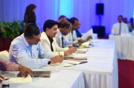 Representatives of resorts sign the agreement to conserve sections of their islands' coral reefs at the Tourism Industry Forum. PHOTO: NISHAN ALI/MIHAARU