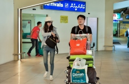 Chinese tourists pictured at Ibrahim Nasir International Airport. PHOTO: NISHAN ALI/MIHAARU