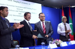 Maldives defence ministry and India's Lovely International Trust signing an MOU to conduct counter terrorism awareness in the Maldives. MIHAARU PHOTO/HUSSAIN SHAYAH