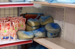 Bags of rice stocked up on a shelf at a retail outlet in the capital Male. MIHAARU PHOTO/HUSSAIN SHAYAAH