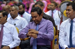 President Yameen checks his watch during the ceremony held in Fuvahmulah city to inaugurate a new water and sewerage system project on Tuesday. PHOTO/PRESIDENT'S OFFICE