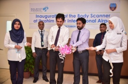 Economic minister Mohamed Saeed (L-3) and home minister Azleen Ahmed (R-3) inaugurate the Body Scanner placed in Ibrahim Nasir International Airport (INIA)'s Arrivals Hall. PHOTO: NISHAN ALI/MIHAARU