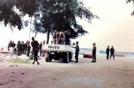 Soldiers of the Indian army inspecting Male on a jeep to find any remaining Sri Lankan mercenaries that might be in hiding after the coup on November 3, 1988.