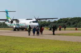 Passengers about to board a Flyme aircraft at Kaadehdhoo Airport. PHOTO/VILLA AIR