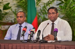 Attorney General Mohamed Anil speaks to reporters at the President's Office regarding MACL's settlement of USD 271 million with India's GMR Group as compensation for breaking off INIA contract. PHOTO: MOHAMED SHARUHAAN/MIHAARU