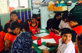 Special Education Needs children drawing in class at Imaduddin School