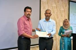 Housing Minister Muizzu Awarding Flat to Dr.Ali Latheef PHOTO: President Office