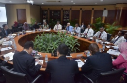 Maldives' ministers and top executives of four international banks meet at STELCO to discuss solutions for the Maldives' waste management crisis. PHOTO: NISHAN ALI/MIHAARU