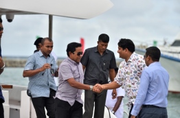 Fisheries Minister Dr Mohamed Shainee (R-2) welcomes President Yameen to GA. Gemanafushi for the celebration of Fishermen's Day 2016. PHOTO/PRESIDENT'S OFFICE
