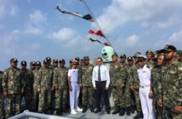 Defence Minister Adam Shareef poses with the officers of MSCG Huravee. PHOTO/MNDF