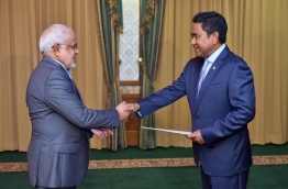 President Yameen (R) appoints Sheikh Mohamed Rasheed Ibrahim as the president of the Supreme Council for Islamic Affairs. PHOTO/PRESIDENT'S OFFICE