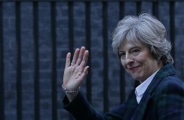Prime Minister Theresa May on Tuesday said Britain will leave the EU's single market in order to restrict immigration in a clean break from the bloc, but lawmakers can vote on the final deal. / AFP PHOTO / Daniel LEAL-OLIVAS