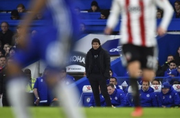 Chelsea's Italian head coach Antonio Conte watches from the touchline during the English FA Cup fourth round football match between Chelsea and Brentford at Stamford Bridge in London on January 28, 2017. / AFP PHOTO / Glyn KIRK / RESTRICTED TO EDITORIAL USE. No use with unauthorized audio, video, data, fixture lists, club/league logos or 'live' services. Online in-match use limited to 75 images, no video emulation. No use in betting, games or single club/league/player publications. /