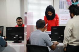Customers at service counters of BML's main branch in capital Male. FILE PHOTO/BML